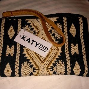 Katy Did Cosmetic purse, with leather strap